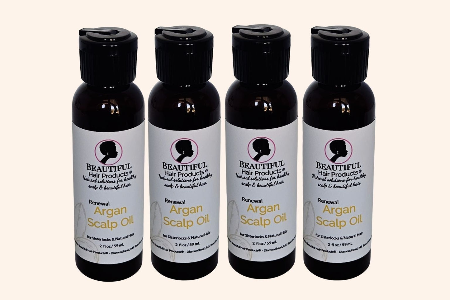4 bottles of Argan Scalp Renewal Growth Oil 2oz bottle with gold and cream label for pure argan oil hair growth treatment