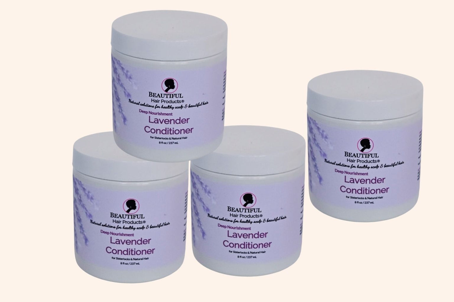 Four jars of Lavender Deep Conditioning Whip jar, 8oz with purple and cream label featuring jojoba and lanolin for high porosity conditioning