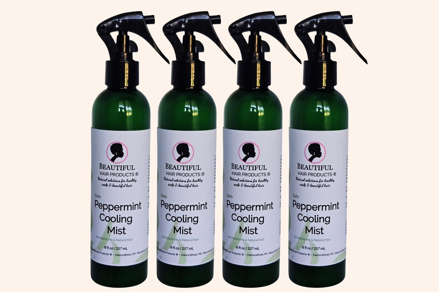 Four bottles of Peppermint Daily Cooling Mist 8oz bottle with green and cream label for Sisterlocks and natural hair moisturizing