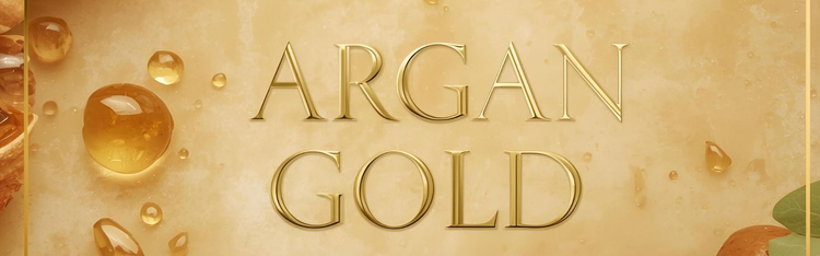Argan Gold Nourish & Repair Collection banner with golden argan nuts, oil droplets and luxurious nourishing imagery in gold and cream brand colors