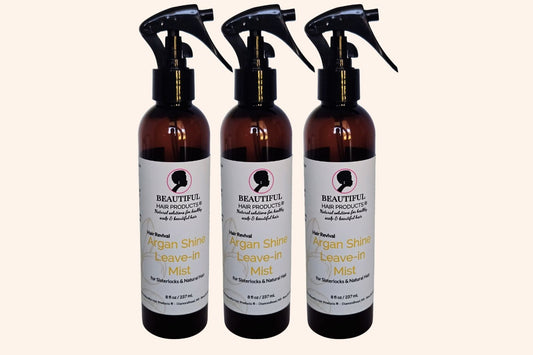 Three bottles of Argan Shine Revival Leave-In Mist bottle, 8oz with gold and cream label featuring argan for medium porosity shine enhancements 