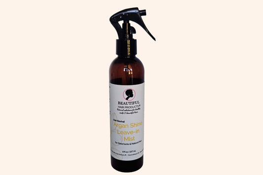 Argan Shine Revival Leave-In Mist bottle, 8oz with gold and cream label featuring argan for medium porosity shine enhancement