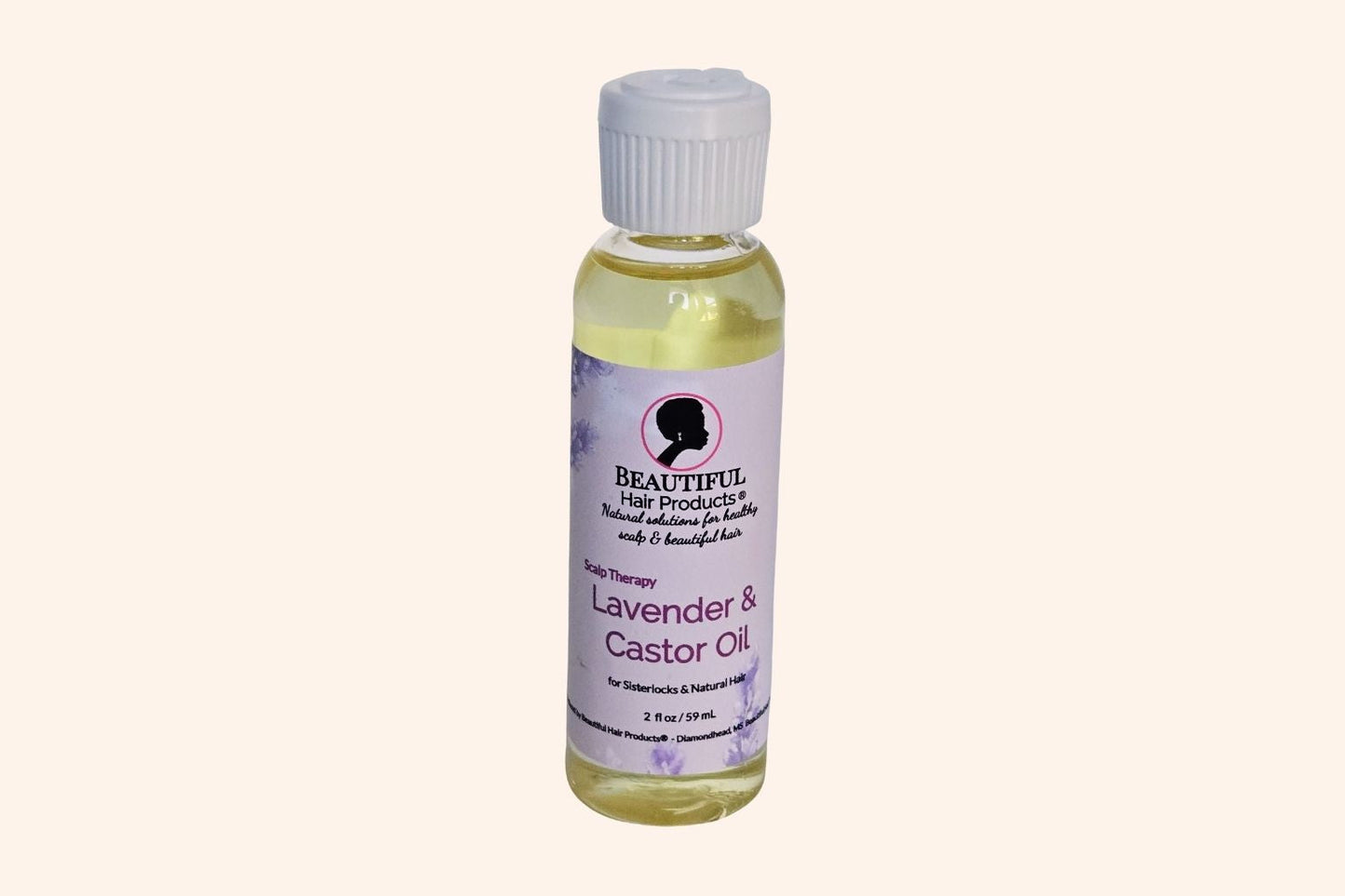 Lavender & Castor Scalp Therapy Oil bottle, 2oz with purple and cream label for therapeutic scalp treatment