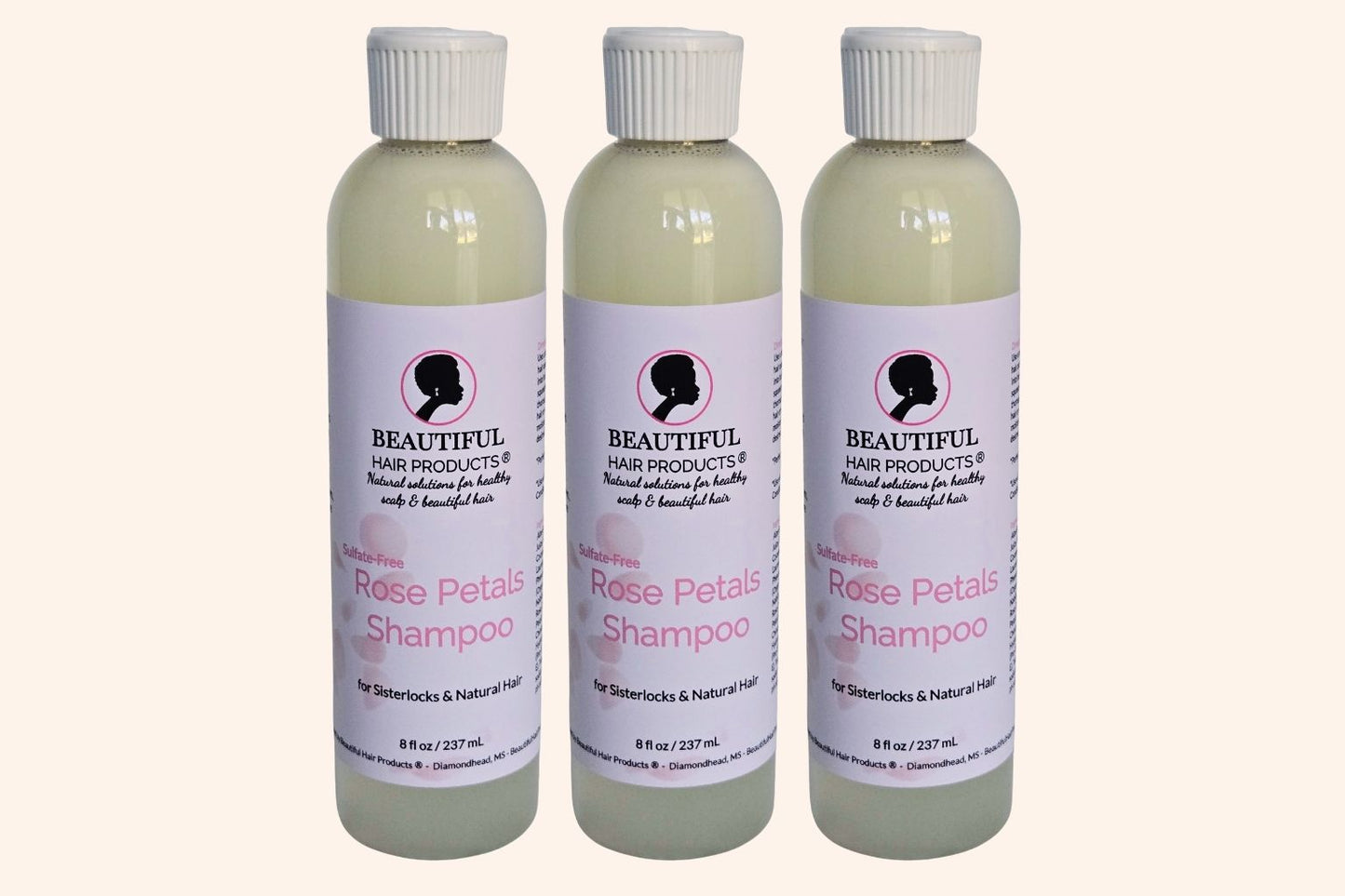 Three bottles of Rose Petals Sulfate-Free Shampoo 8oz bottle with pink and cream label for gentle medium porosity hair cleansing
